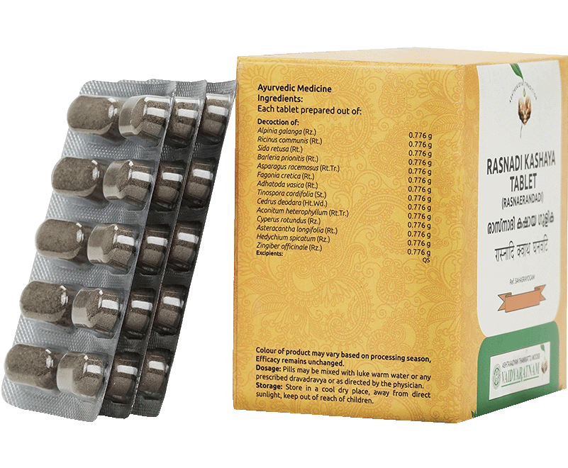 Close-up of Vaidyaratnam Rasnadi Kashaya Gulika tablets, an Ayurvedic medicine for gout and neuralgic pain.